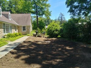 Liberty Lawn Services Crew prepares lawn and installs sod.